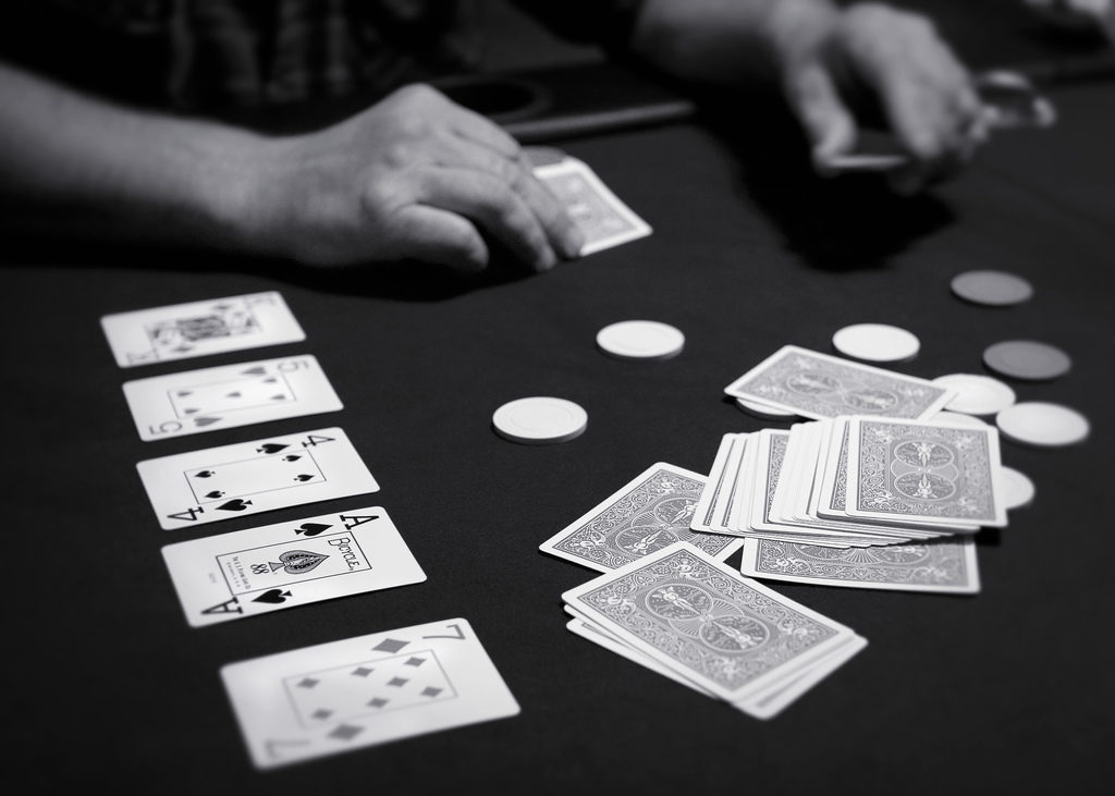 Hand Your Dealt – Image of poker game in progress.